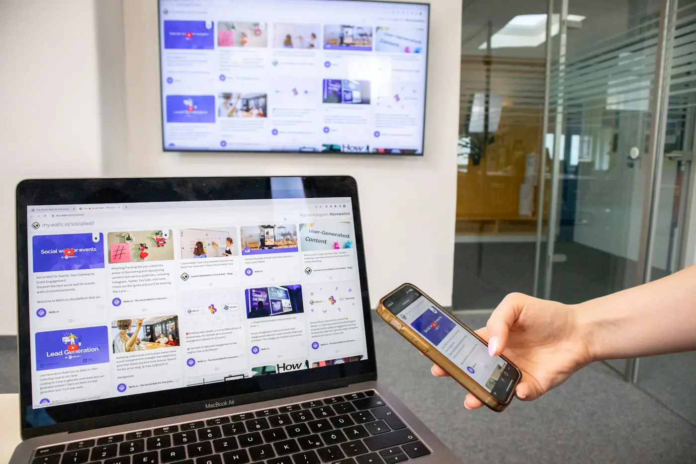 A web page open on a laptop and the same page on a phone